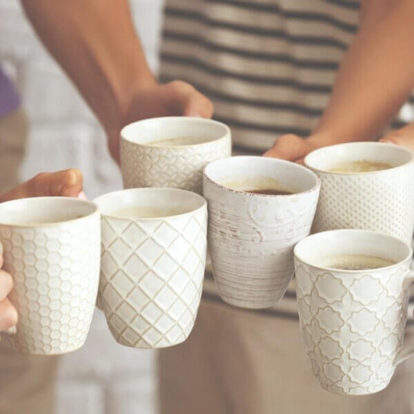 Cups of coffee connecting a community of people together.